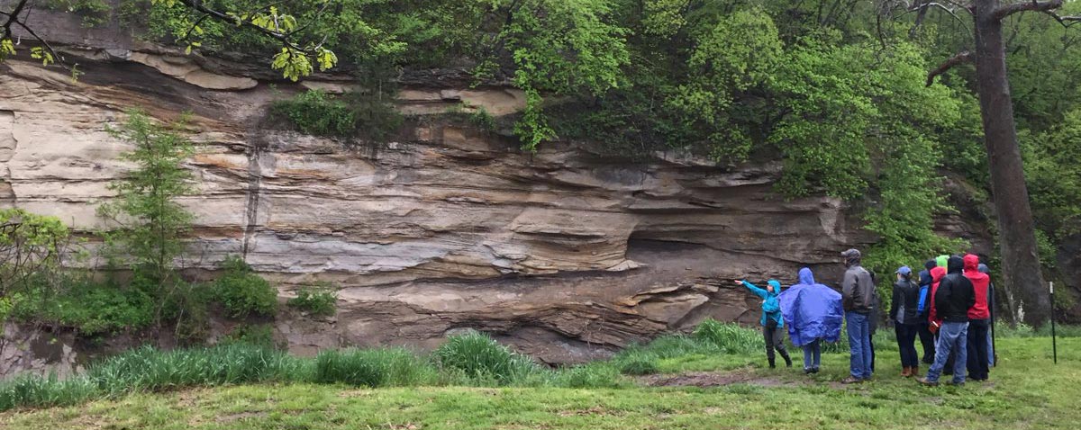 Class learning about geology outside