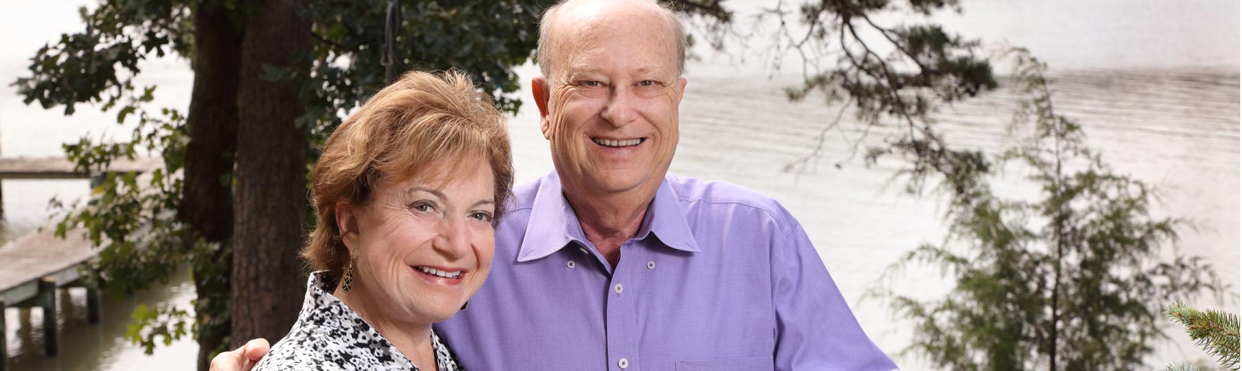 Couple standing on deck