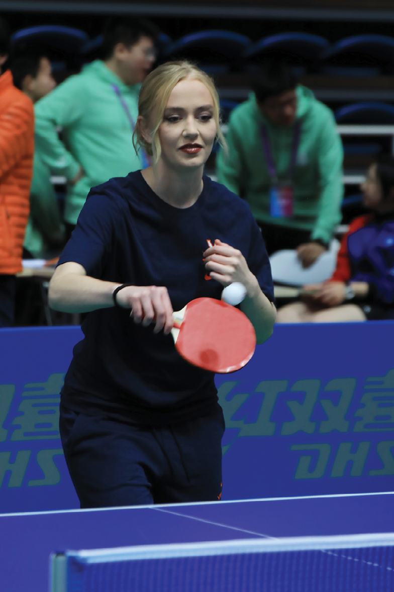 Misa Layne playing table tennis in China