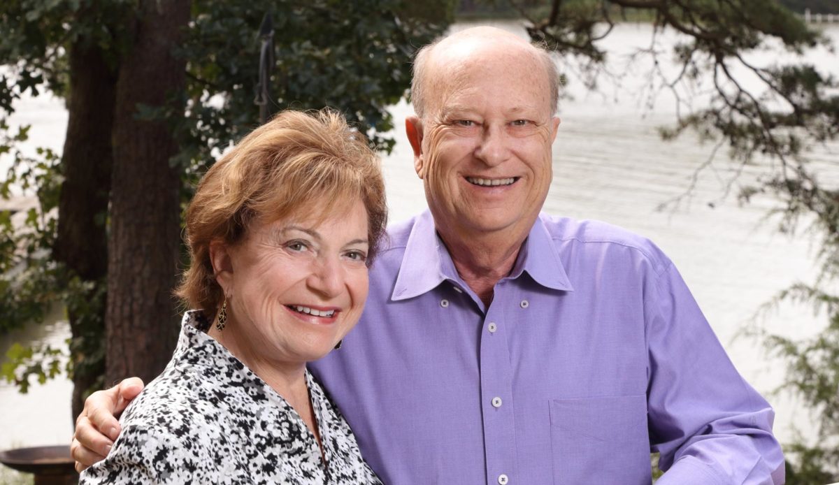 Couple standing on deck